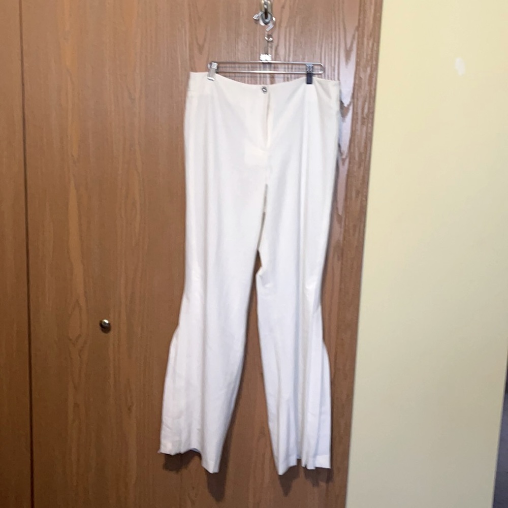 Classy off white bell bottoms pant with a slit and pleads at leg very beautiful
